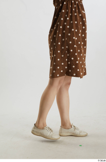 Aera  1 brown dots dress casual dressed flexing leg…